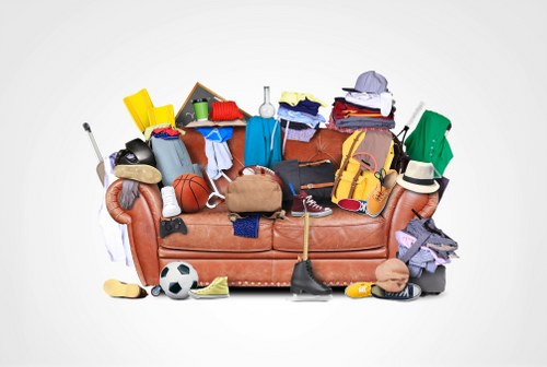House clearance team sorting items in Holborn home